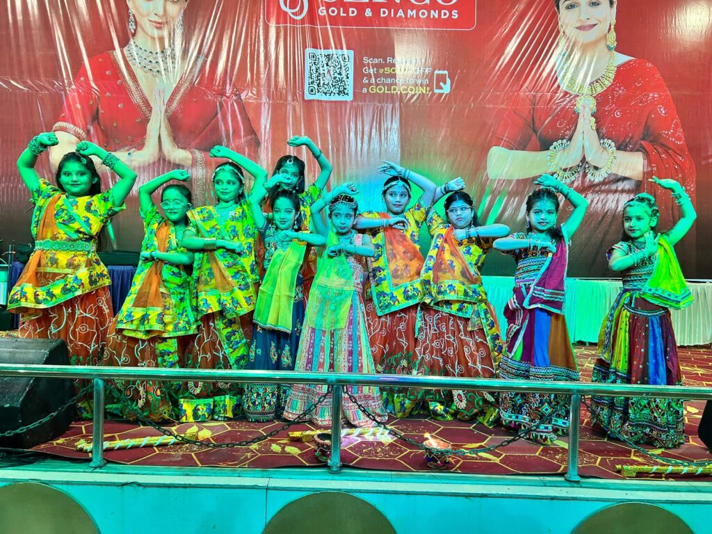 Celebration moment at Rajnagar Extension Puja Evam Sanskritik Trust